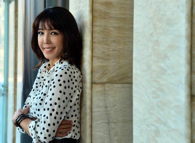 Musical actress Jeon Soo-kyeong poses during an interview with The Korea Herald at the Millennium Seoul Hilton hotel. (Yoon Byung-chan/The Korea Herald)