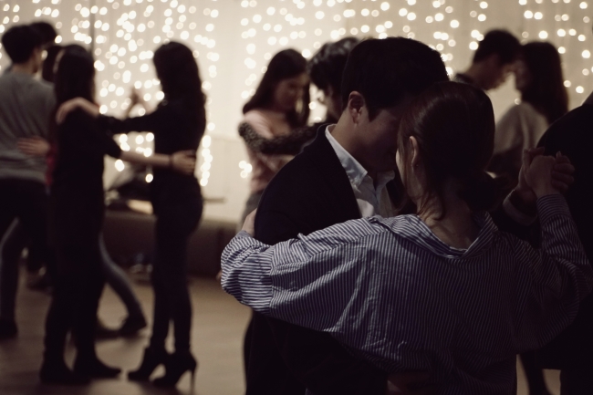 Participants in the D Museum’s tango class dance with partners on Feb. 13. (D Museum)