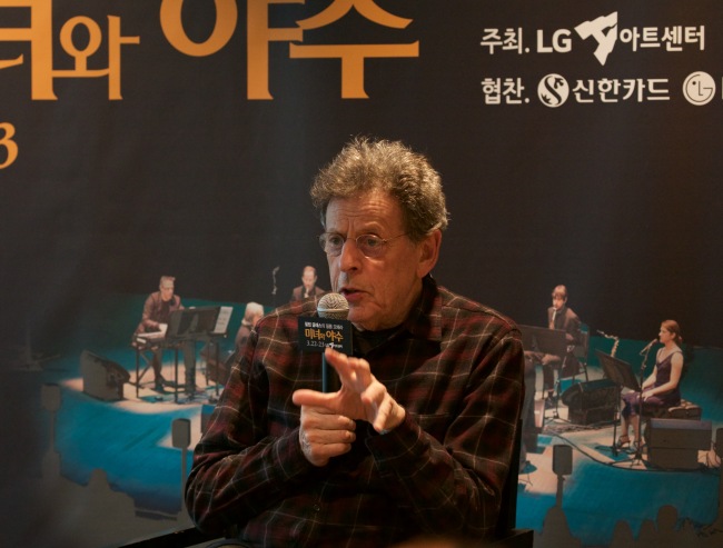 American composer Philip Glass speaks at a press conference at the LG Arts Center in Gangnam-gu, Seoul, on Tuesday. (Yonhap)