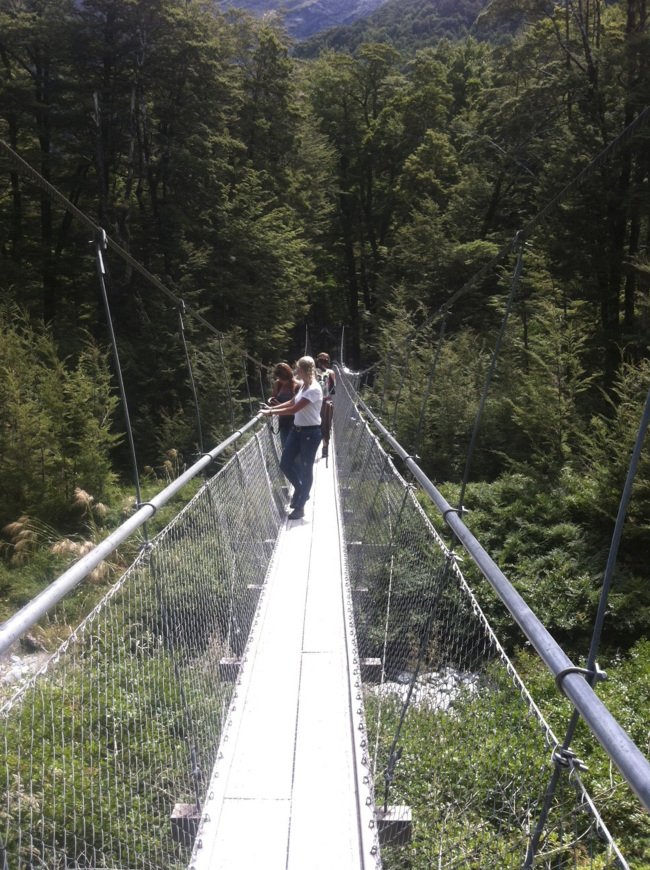 Many popular trails feature substantial maintenance and development, like this suspension bridge on the Routeburn Track in New Zealand. (Orange County Register/TNS)
