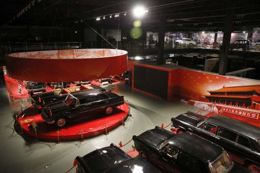 In this March 27, 2016, photo, Red Flag car models are on display with other vintage cars collected by Luo Wenyou at his private museum in Huairou district of Beijing on March 27. (AP-Yonhap)
