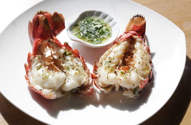 Broiled lobster tails with fresh herb and chive glaze. (Regina H. Boone/ Detroit Free Press/TNS)