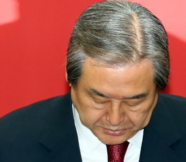 Saenuri Party chair Kim Moo-sung pauses during a news conference at the National Aseembly on Thursday. (Yonhap)