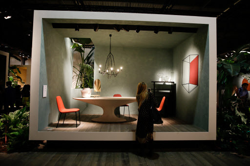 A woman views an exposition at the Zanotta space, as part of the design fair, in Rho, near Milan, Italy. (AP-Yonhap)