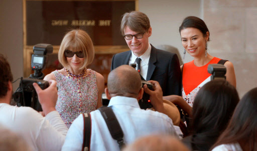 This image released by the Tribeca Film Festival shows, from left, Anna Wintour, Andrew Bolton and Wendi Deng in a scene from “The First Monday in May.”  (AP-Yonhap)
