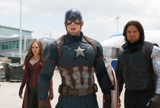 This image released by Disney shows, from left, Elizabeth Olsen, Chris Evans, and Sebastian Stan in a scene from Marvel’s “Captain America: Civil War,” which opened in theaters across Korea on Wednesday. (AP-Yonhap)
