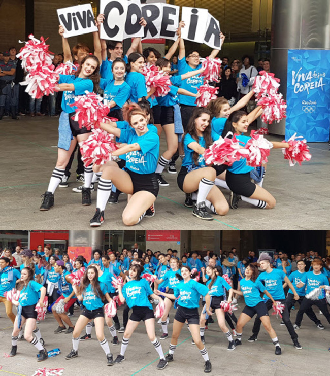 K-POP IN BRAZIL -- About 200 people, including members of “Viva Coreia,” a group of hallyu fans, perform a K-pop flash mob dance in Sao Paulo on April 27, 100 days before the opening of the Rio 2016 Summer Olympics. (Yonhap)
