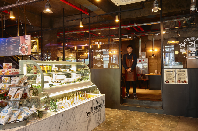 An interior view of YG Entertainment’s 3 Birds cafe in Myeong-dong. (YG Entertainment)