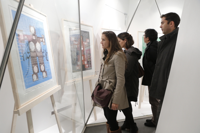Visitors view artwork display at a street museum in Pil-dong (2016 Street Arts Festival Organizing Committee)