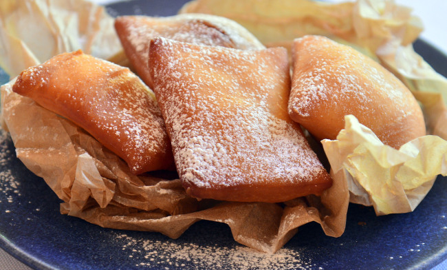 S-Tavern’s four beignets -- plain, shrimp gumbo, caramelized apple, cheese -- showcase both sweet and savory variations of the New Orleans fritters. (Photo credit: Lee Sang-sub/The Korea Herald)