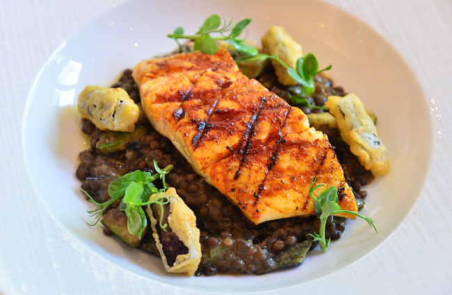 The grilled seasonal fish with zucchini, fried eggplant and lentils is served straight off S-Tavern‘s state-of-the-art grill. (Photo credit: Lee Sang-sub/The Korea Herald)