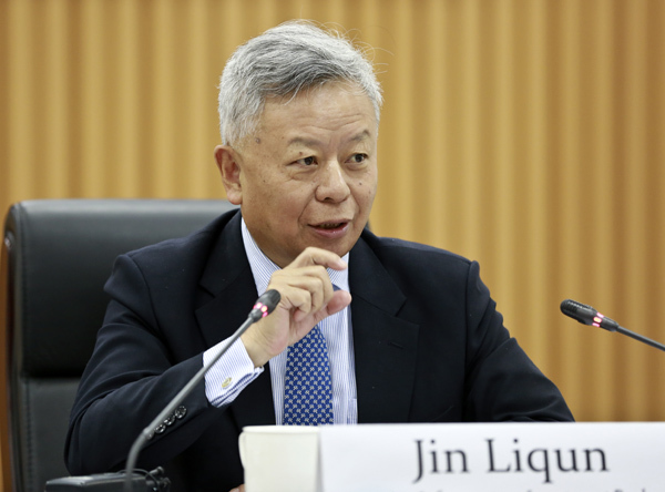 Jin Liqun, president of the Asian Infrastructure Investment Bank, speaks at the annual board meeting of the Asia News Network held at China Daily in Beijing on Tuesday. Asia News Network