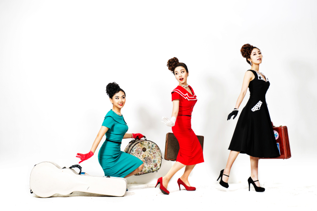 Promotional image of the female retro-pop musical trio The Barberettes. (EggPlant)