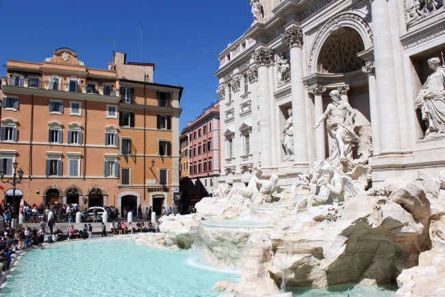 The newly-restored Trevi Fountain in Rome draws thousands of tourists. (Detroit Free Press/TNS)