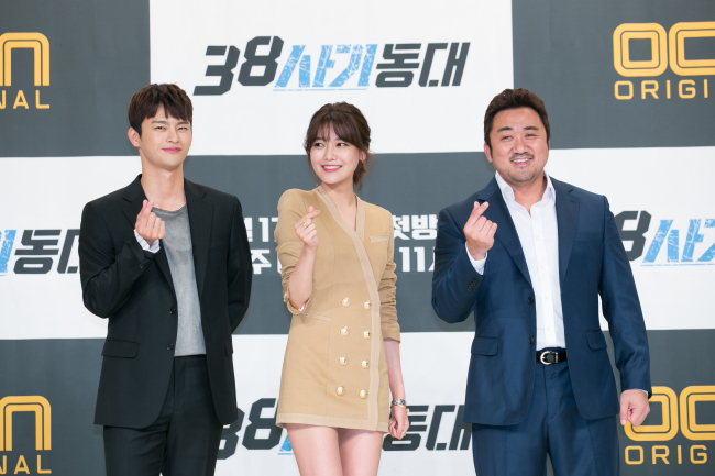 From left: Seo In-guk, Choi Soo-young and Ma Dong-seok pose at a press conference for OCN series “Squad 38” at Yeongdeungpo Times Square on Wednesday. (CJ E&M)