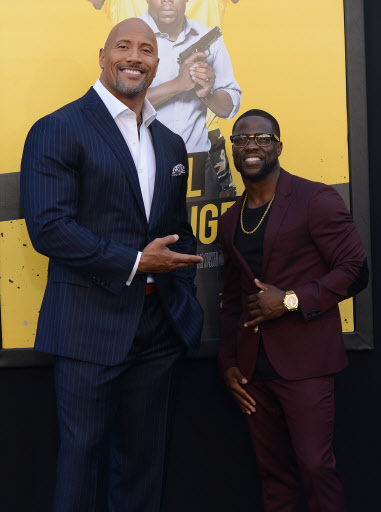 Dwayne Johnson (left) and Kevin Hart attend the Warner Bros Premiere of Central Intelligence, in Westwood, California, on June 10. (AFP-Yonhap)