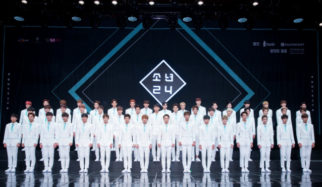 The 49 contestants of “Boys 24” pose for the camera at a press conference for the new audition program’s launch in Seoul on Thursday. (CJ E&M)