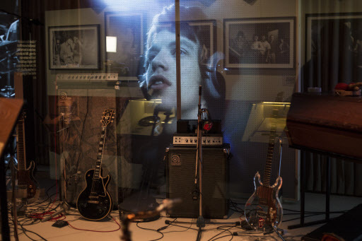 An image of Mick Jagger forms the backdrop of a re-created music studio as part of “Exhibitionism,” the interactive multimedia exhibition of the Rolling Stones’ career so far, at the Saatchi Gallery in Kings Road, London. (AP-Yonhap)