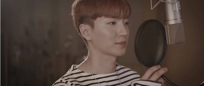 Leeteuk of Super Junior sings “My Hero” in a recording studio. (SM Entertainment)