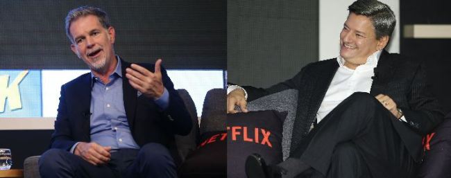 Reed Hastings (left), the CEO of Netflix, and Netflix chief of content Ted Sarandos speak to reporters at a press conference in Seoul on Thursday. (Yonhap)