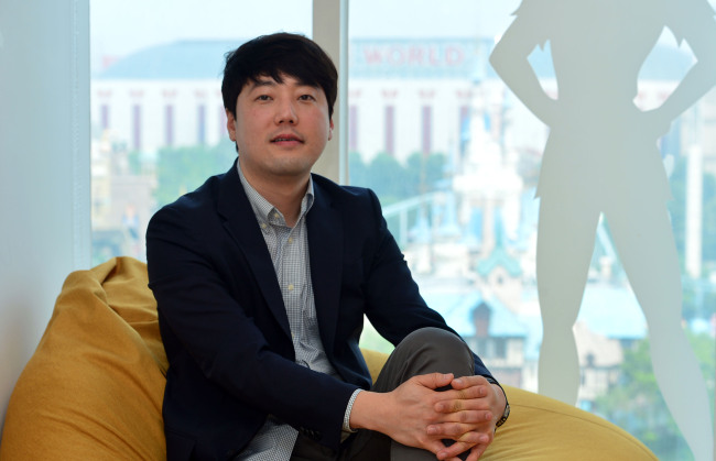 Cho Sung-woo, CEO of Baemin Fresh, poses at his office in Seoul on Tuesday. (Yoon Byung-chan/The Korea Herald)