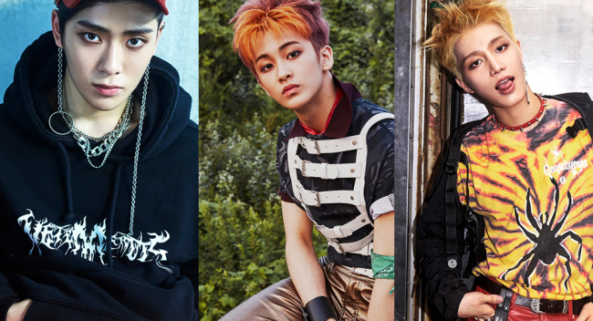 NCT 127 members Jaehyun Mark and Taeil in the SM Entertainment debut promo cited by Korea Herald as part of a new era of multinational K-pop groups following the Cross Gene template