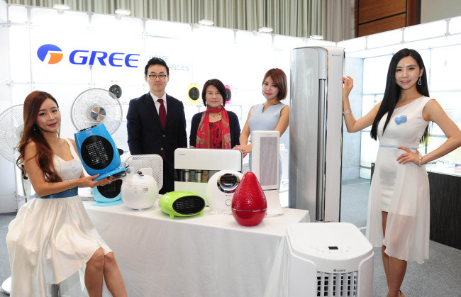 China's Gree Group introduces its air purifier models during official launching show in Korea