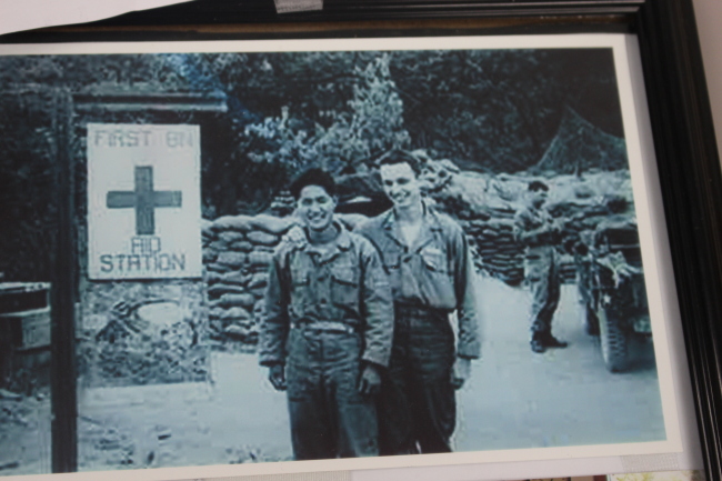 This photo shows Yu Yong-bong during the 1950-53 Korean War with U.S. medical officer Edward Guy. (Yoon Min-sik/The Korea Herald)