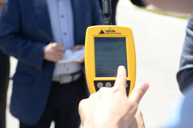 A electromagnetic radiation measuring device shows the level of 0.0001 watts per square meter during a press tour to the Anderson air base in Guam on Monday. (The U.S. Air Force's 36th Wing)