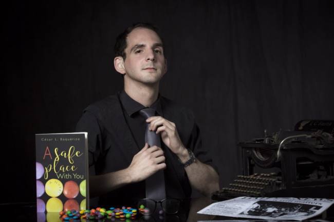 Ecuadorian author Cesar Baquerizo with his book “A Safe Place With You” (A Safe Place With You/Official Facebook)