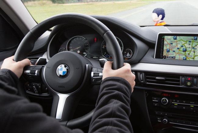 A driver tests the BMW 5 Series Pro Edition’s Pedestrian Warning system. (BMW Korea)