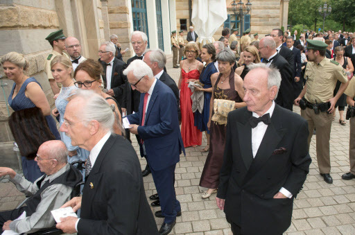 Members of the German police stand guard as visitors arrive to the opening of the Bayreuth Festival, in Bayreuth, Germany, on Monday. (EPA-Yonhap)