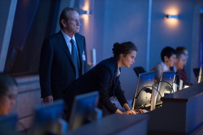 Tommy Lee Jones (left) and Alicia Vikander star in “Jason Bourne.” (Universal Pictures)