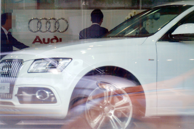 Dealers are seen at an Audi store in southern Seoul. The Investor