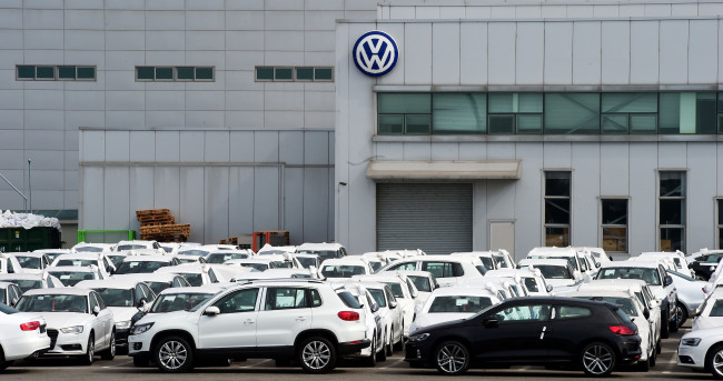 Volkswagen cars are parked at a warehouse near the Pyeongtaek Port.