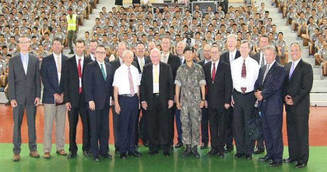 FEBC - Korea chairman the Rev. Billy Jang-hwan Kim (front row second from left) poses with a U.S. delegation at a military training camp in South Chungcheong Province, before a mass baptism ceremony on Saturday.  (FEBC - Korea)