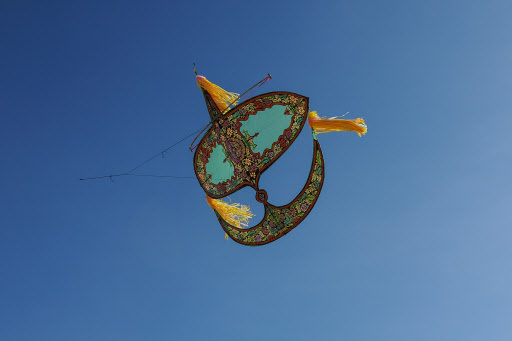 A traditional “wau bulan,” crafted and owned by kite-maker Shafie Jusoh, is seen in flight at Pantai Geting Beach on the outskirts of Tumpat in Malaysia’s northeastern Kelantan state. (AFP-Yonhap)