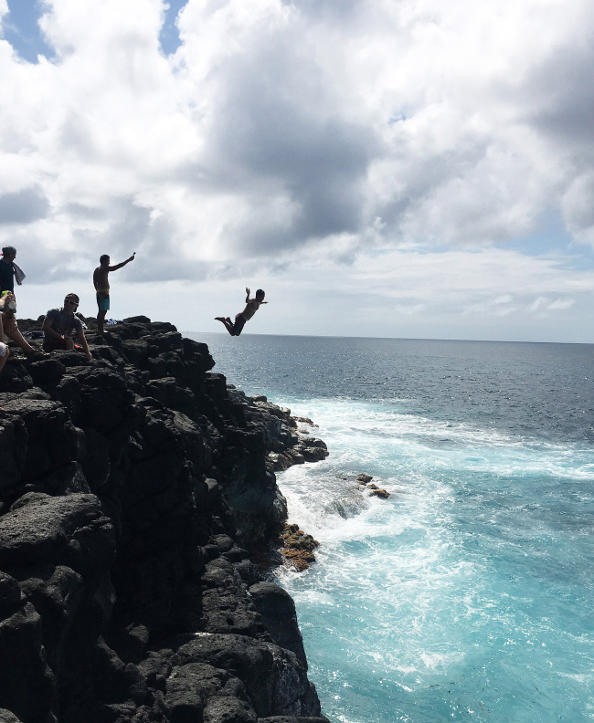 Ambrosio Avestruz takes the plunge from a large cliff at Queen’s Bath. Be warned: this can be a dangerous endeavor. (Laylan Connelly/Orange County Register/TNS)