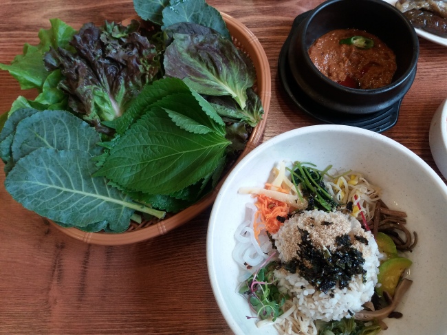 A bowl of barley rice with greens at Jeongtong Babjip (Christine Cho)