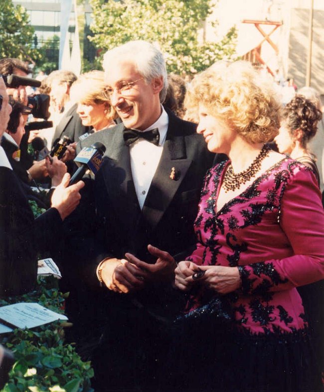 Producer Steven Bochco and wife Barbara Bosson speak on the red carpet at the Emmys in 1994. (Alan Light)