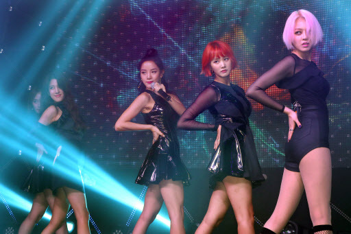 K-pop girl group Spica performs at a press showcase for the release of its album “Secret Time” in Seoul on Thursday. (Yonhap)