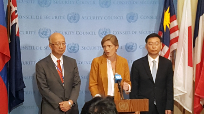 US Ambassador Samantha Power (center) speaks to the press next to South Korean Ambassador Hahn Choong-hee (right) and Japanese Ambassador Koro Bessho, following the United Nations Security Council’s closed-door meeting to discuss the latest missile launches by North Korea at the United Nations in Manhattan, New York, on Sept. 6.
