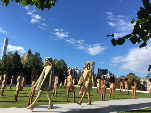 Models wear the Yeezy Season 4 collection by Kanye West during a fashion show on Wednesday at the Franklin D. Roosevelt Four Freedoms Park on Roosevelt Island in New York. The show, set to an eerie soundtrack, helped kick off New York Fashion Week. (AP)