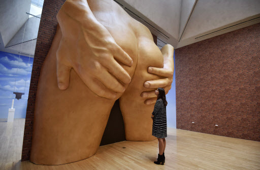 A gallery assistant looks at Turner Prize nominee Anthea Hamilton’s piece “Project for a Door (After Gaetano Pesce) 2016” at the Tate Britain in London, Monday. (EPA-Yonhap)