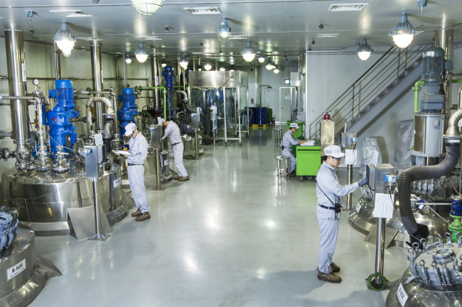 SK Biotek employees at work inside the company’s production facility in Daejeon. (SK Biotek)