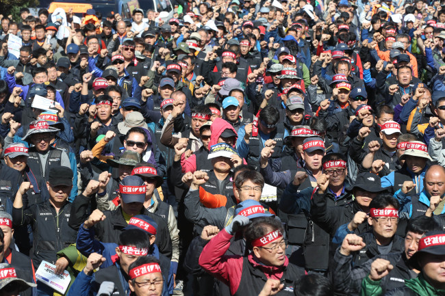 Unionized cargo truck drivers join general strike on Oct. 10.