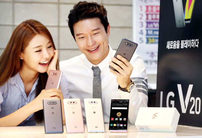 Models promote LG Electronics' V20 smartphone. LG