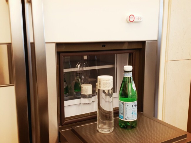SKT's "smart order" button attached to a refrigerator (Sohn Ji-young/The Korea Herald)