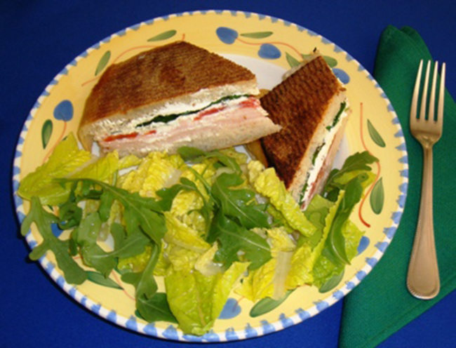 Smoked turkey and cheese panini, with Italian arugula salad (TNS)