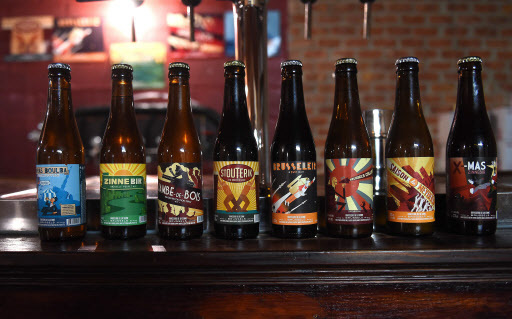 This file photo taken on Oct. 23, 2015 shows various beers produced by Belgian micro-brewery “Brasserie de la Senne” on display at the brewery in Brussels. (AFP-Yonhap)
